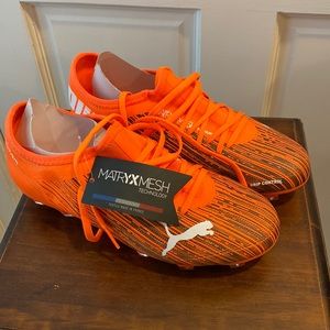 Youth soccer cleats. NWT